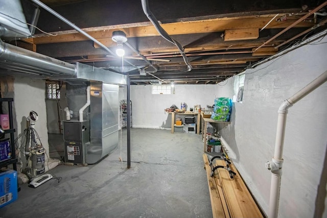 basement featuring heating unit