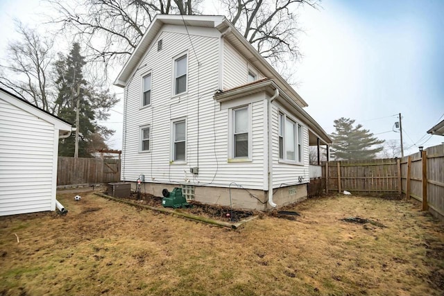 exterior space with a fenced backyard