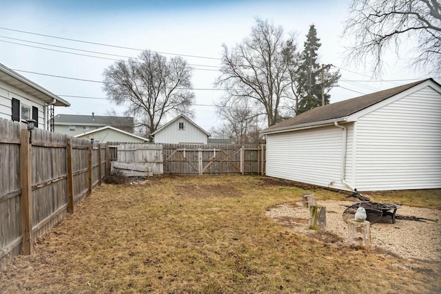 view of yard with a fenced backyard