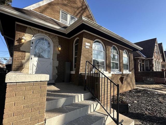 view of front of property featuring brick siding