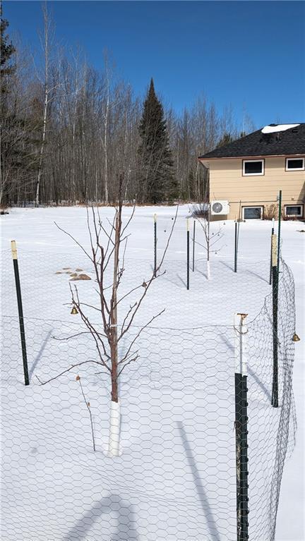 14091 W County Highway B, Hayward, WI 54843 - view of yard layered in snow