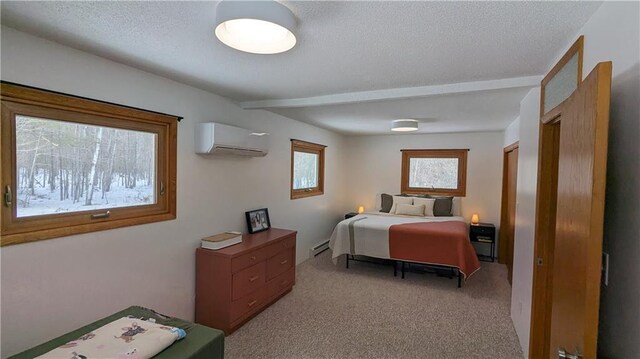 14091 W County Highway B, Hayward, WI 54843 - bedroom featuring a baseboard radiator, light colored carpet, a textured ceiling, and a wall mounted air conditioner