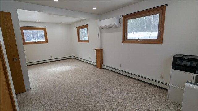 14091 W County Highway B, Hayward, WI 54843 - empty room featuring recessed lighting, an AC wall unit, light carpet, and baseboard heating