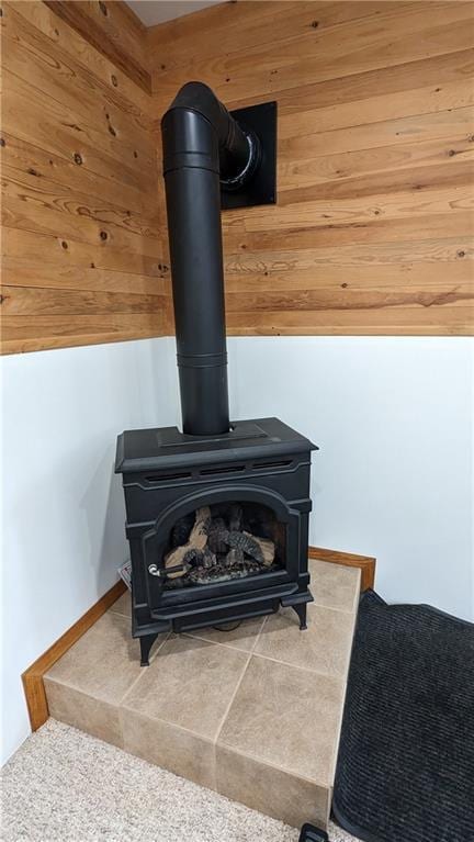 14091 W County Highway B, Hayward, WI 54843 - details featuring a wood stove and wooden walls