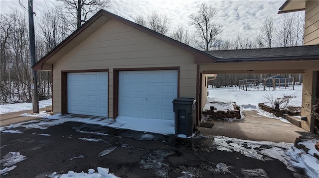 14091 W County Highway B, Hayward, WI 54843 - view of snow covered garage