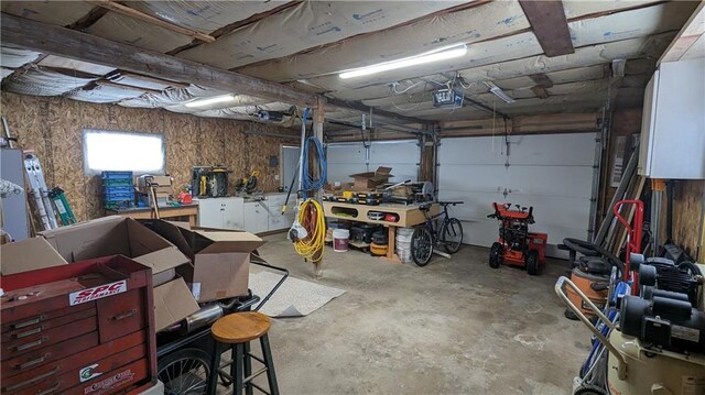 14091 W County Highway B, Hayward, WI 54843 - garage featuring a garage door opener