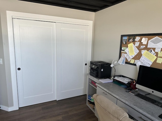 office space featuring dark wood-type flooring