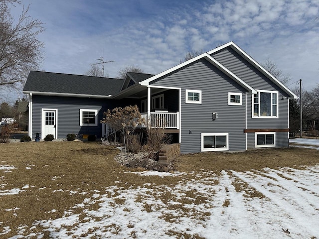 view of snow covered house