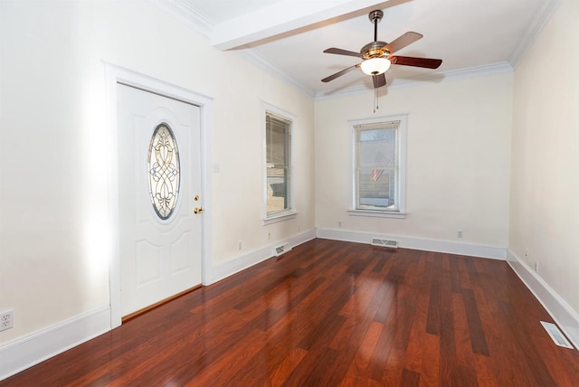 foyer entrance featuring hardwood / wood-style floors, visible vents, and crown molding