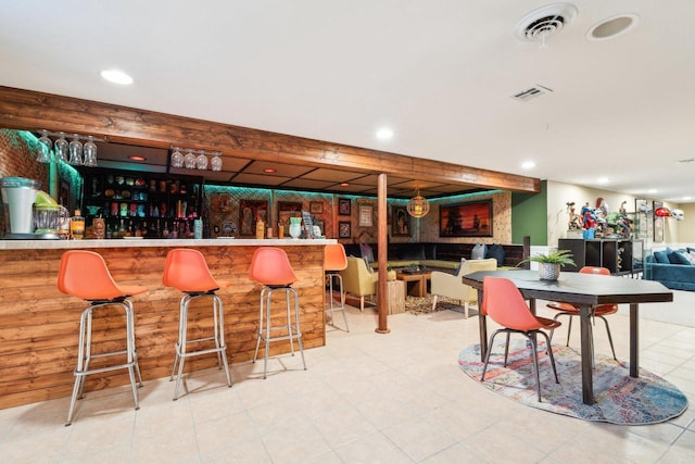 bar with visible vents, recessed lighting, and a bar