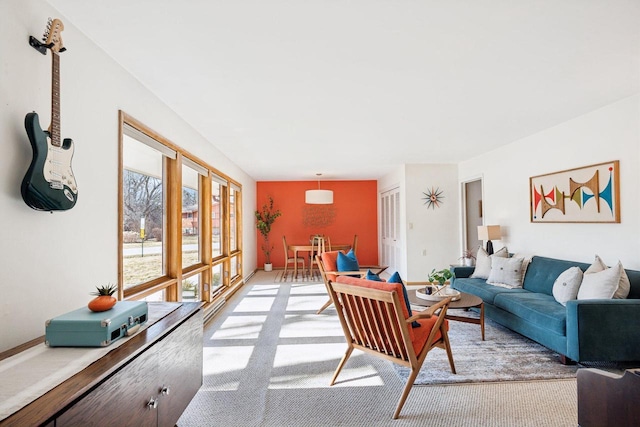 living area with light colored carpet