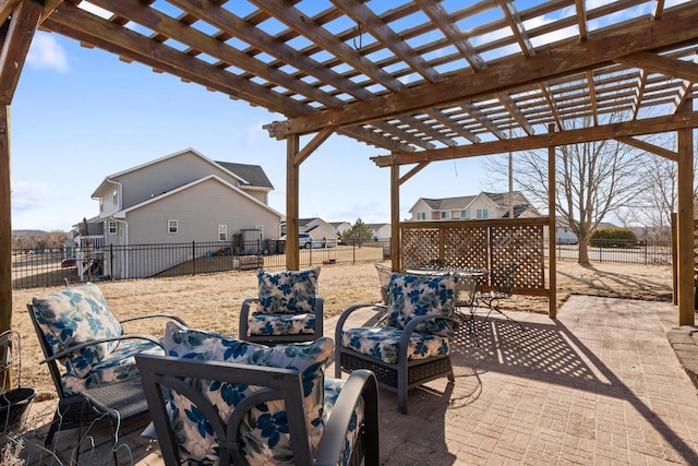 view of patio / terrace featuring outdoor dining space, a pergola, and a fenced backyard