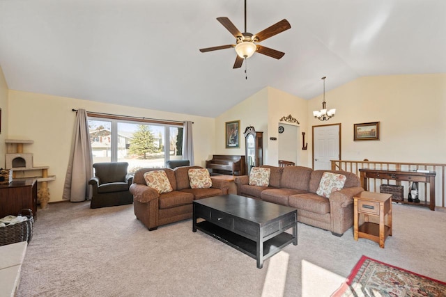 living room featuring light carpet, ceiling fan with notable chandelier, and vaulted ceiling