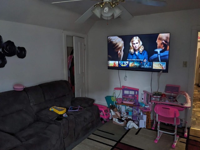 living room featuring a ceiling fan