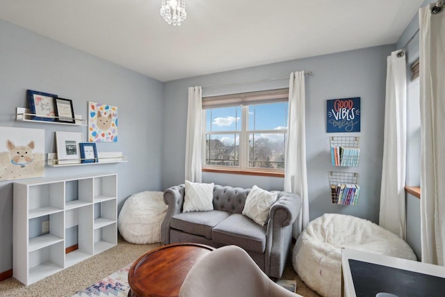 sitting room with carpet floors