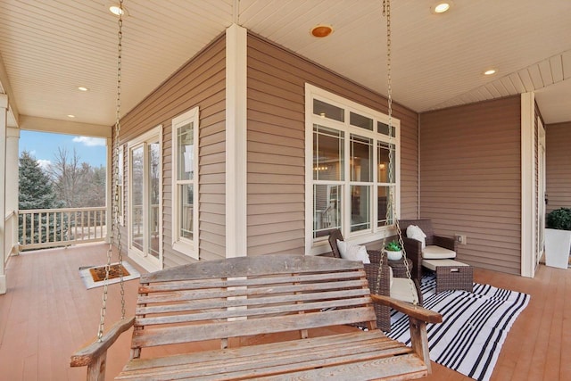 wooden deck featuring a porch