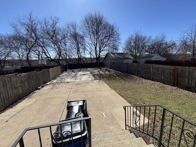 view of yard with a fenced backyard