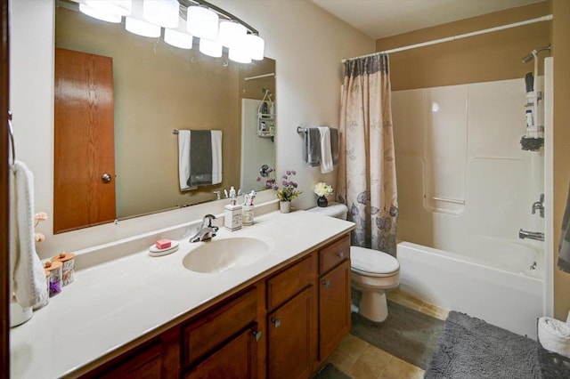 bathroom featuring tile patterned floors, shower / tub combo, toilet, and vanity