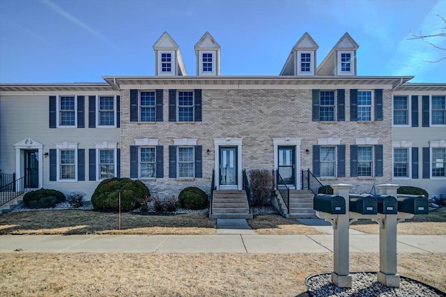 multi unit property featuring brick siding