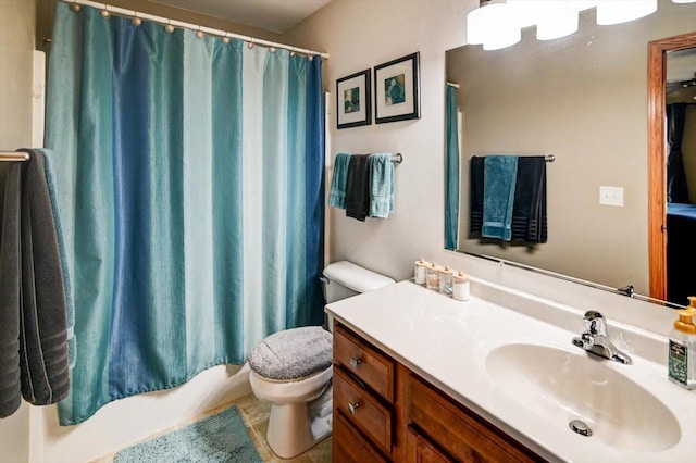 full bathroom with vanity and toilet