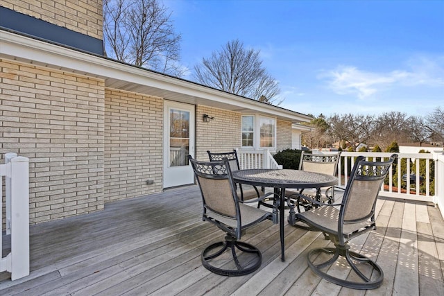 deck featuring outdoor dining area