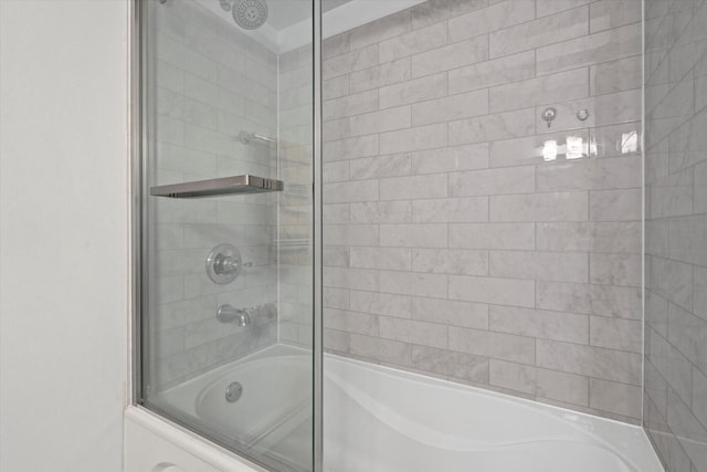 full bathroom featuring combined bath / shower with glass door