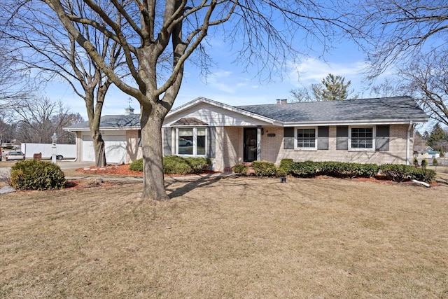 ranch-style house featuring fence, a front yard, an attached garage, brick siding, and a chimney