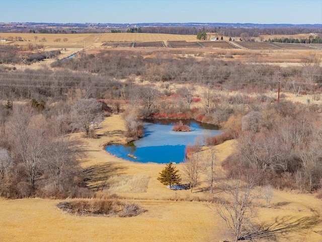 aerial view featuring a water view and a rural view