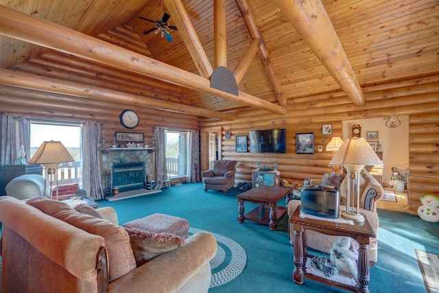 living room featuring wood ceiling, beamed ceiling, a stone fireplace, carpet floors, and high vaulted ceiling