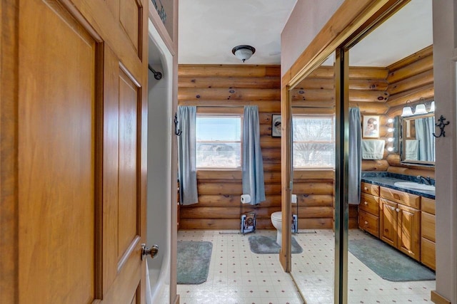 bathroom featuring vanity, toilet, and tile patterned floors