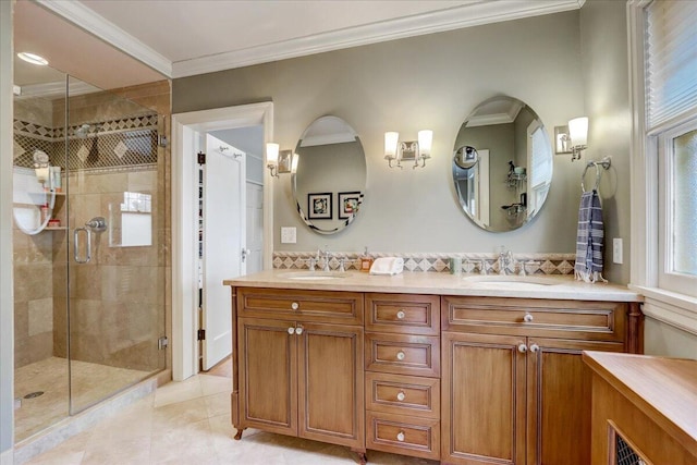 full bath featuring double vanity, a stall shower, ornamental molding, tile patterned flooring, and a sink