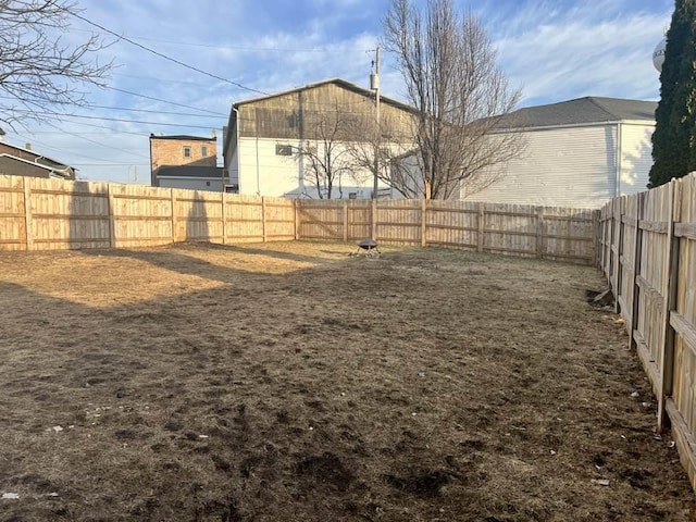 view of yard featuring a fenced backyard