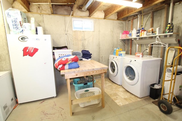 laundry room with laundry area and washer and dryer