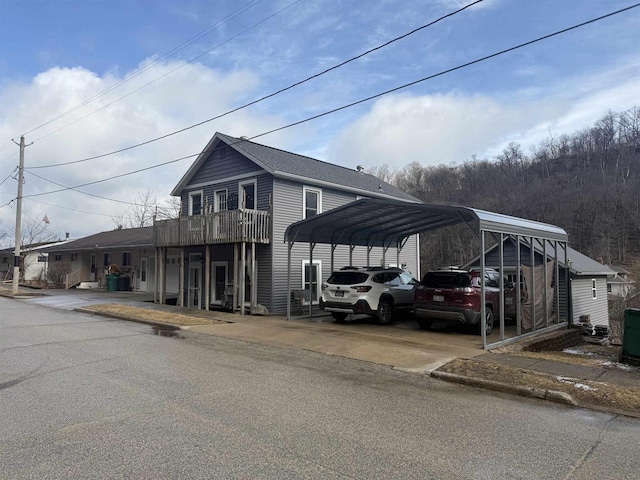 view of front facade with a detached carport