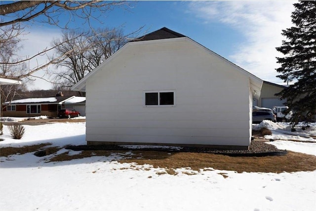 view of snow covered property