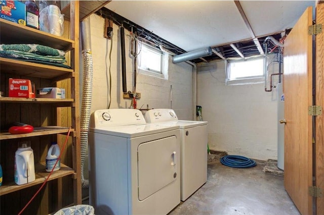 laundry room featuring washer and clothes dryer and laundry area