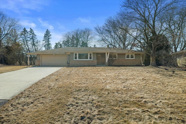 ranch-style house featuring driveway and an attached garage