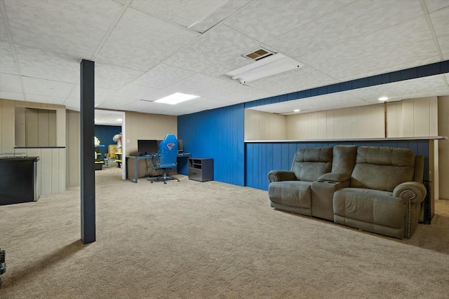 carpeted home office featuring a paneled ceiling and visible vents