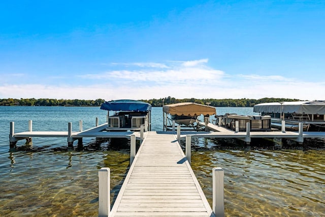 view of dock with a water view and boat lift