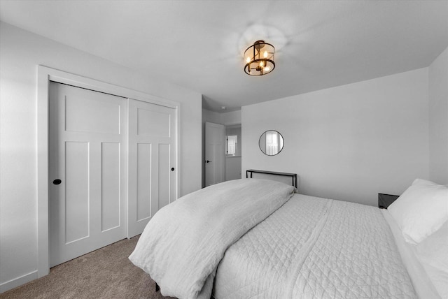 bedroom with carpet floors and a closet