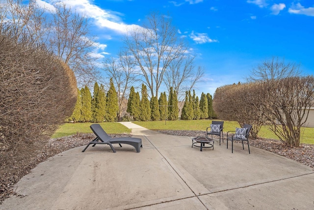 view of patio featuring a fire pit