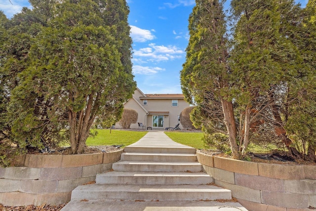 exterior space featuring a front yard