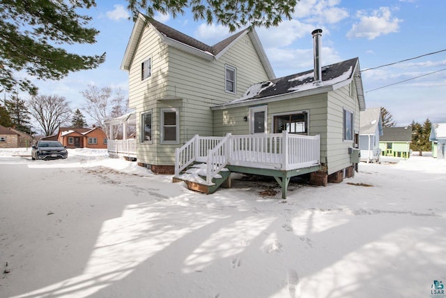 view of front of house featuring a wooden deck