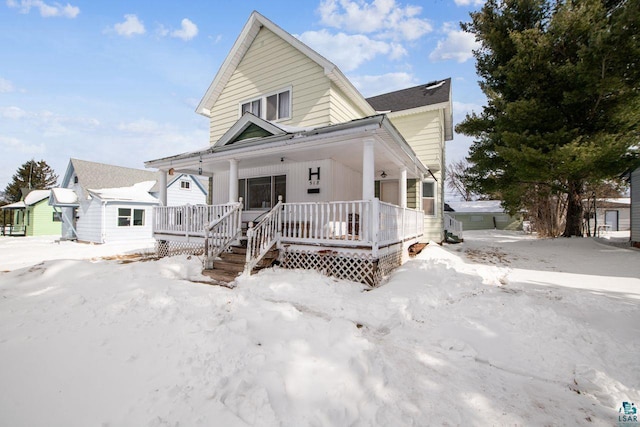 view of front of property featuring covered porch