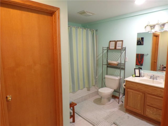 bathroom featuring visible vents, toilet, a shower with curtain, tile patterned floors, and vanity