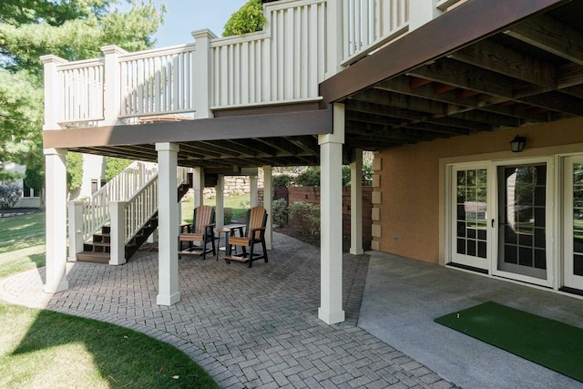 view of patio with stairway