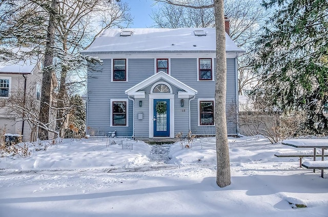 view of front of property featuring a chimney