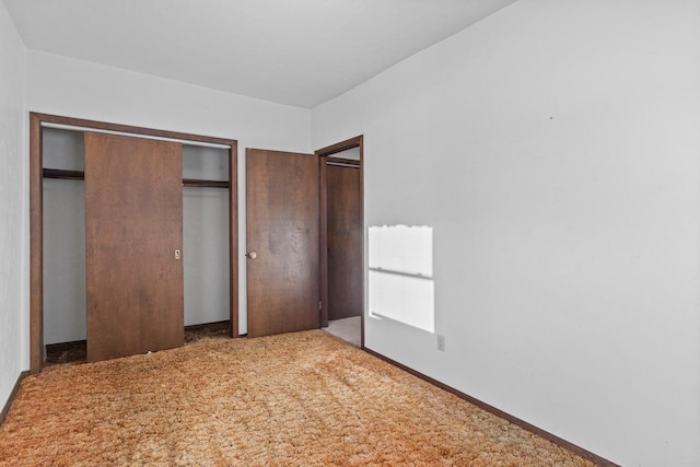 unfurnished bedroom with carpet floors