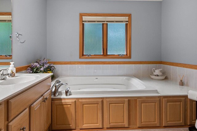 1680 N Aurora Ln, Nekoosa, WI 54457 - full bath featuring vanity and a garden tub