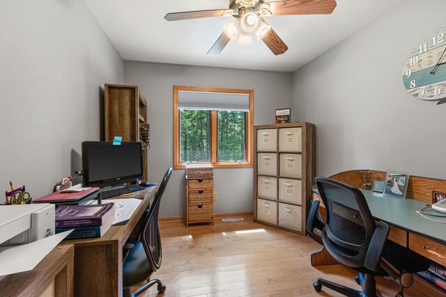 1680 N Aurora Ln, Nekoosa, WI 54457 - office with a ceiling fan, baseboards, and light wood finished floors